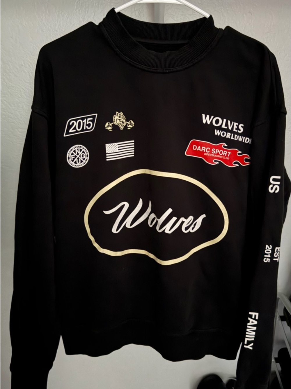 Darc Sport Black Crewneck Sweater with Gold and Red Accents